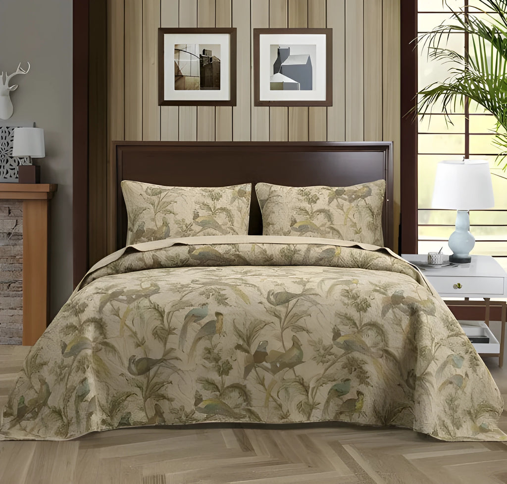Blue American floral pattern cotton quilted bedspread set with three pieces on a bed