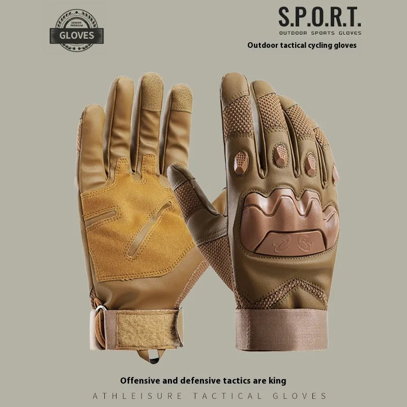 Men's black full finger tactical gloves with touch screen fingertips on a hand holding a phone.