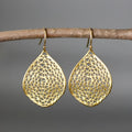 Gold retro leaf hollow pendant earrings with drop-shaped silhouette and intricate pattern design