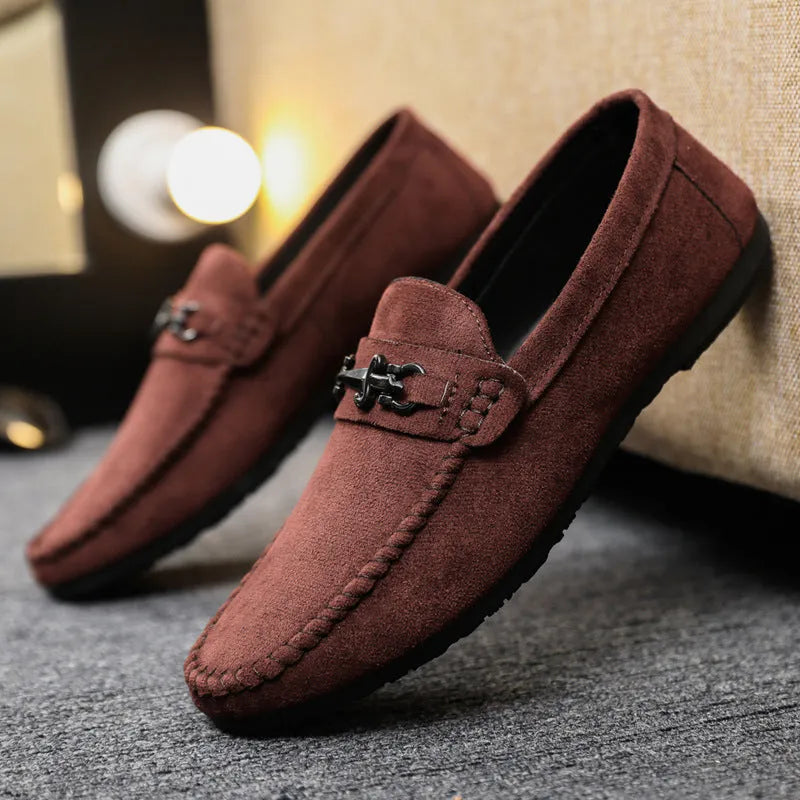 Men's black waterproof PU slip-on loafers with a round toe and low stiletto heel on a rubber sole.
