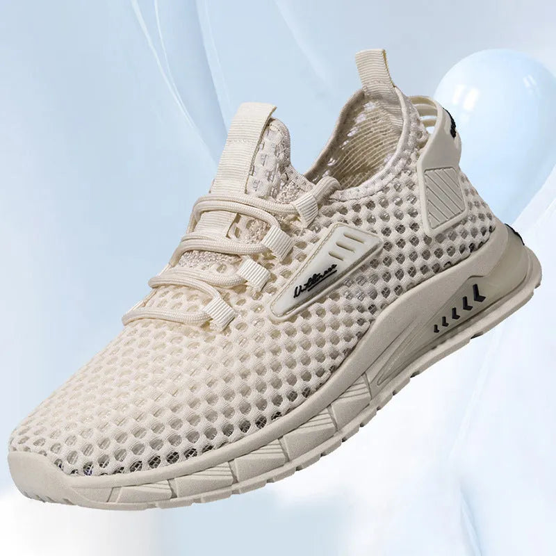 Men's beige casual sneaker with mesh detail, synthetic leather upper, and flat EVA sole on a plain background.