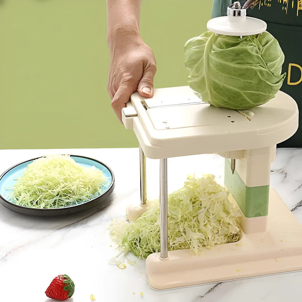 Beige kitchen vegetable slicer tool with stainless steel blades for shredding and spiralising