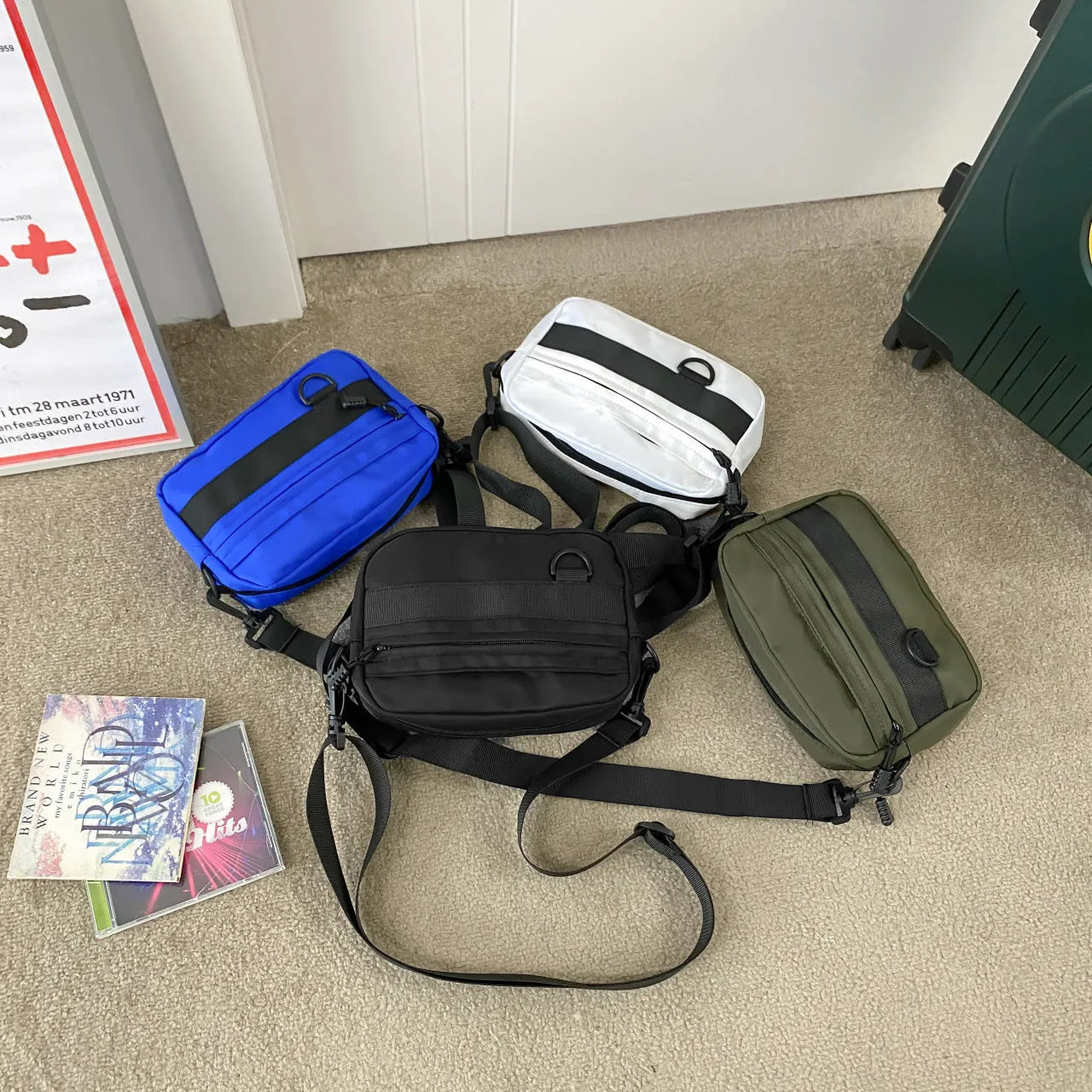Men's street trend messenger bag in nylon available in black, blue, green or white