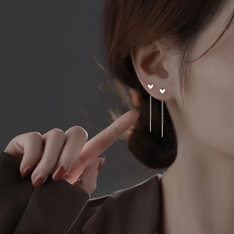 Long sterling silver needle ear string with a choice of geometric or pearl pendants for women.