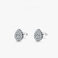 A pair of silver water drop shaped stud earrings with a diamond-cut faceted surface.