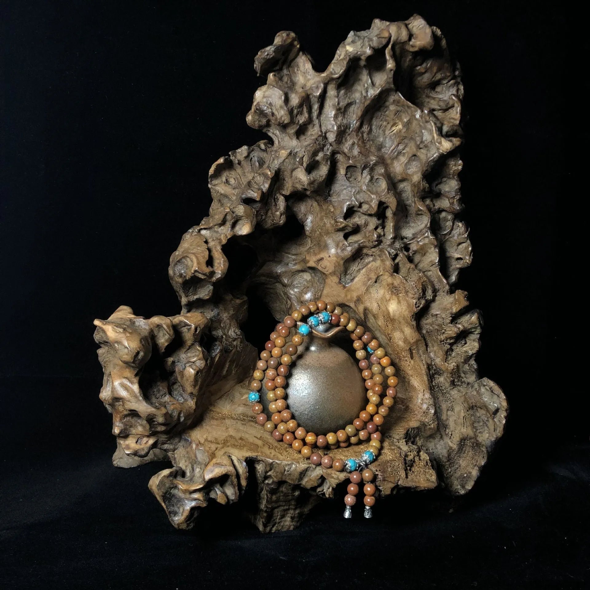Stone bracelet with 108 hand-polished geometric beads measuring 5-6mm diameter