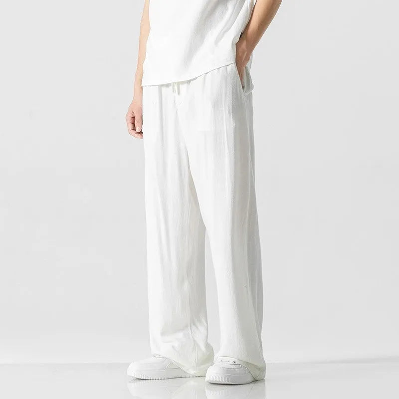 Men's bamboo fibre linen trousers in loose straight-leg cut with cropped length and drawstring waist