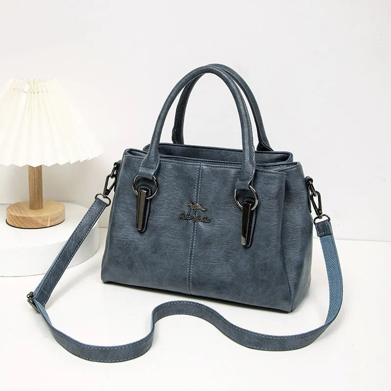 Women's large capacity crossbody soft leather bag in PU material, horizontal square shape, with sandwich zipper pocket, available in multiple colours