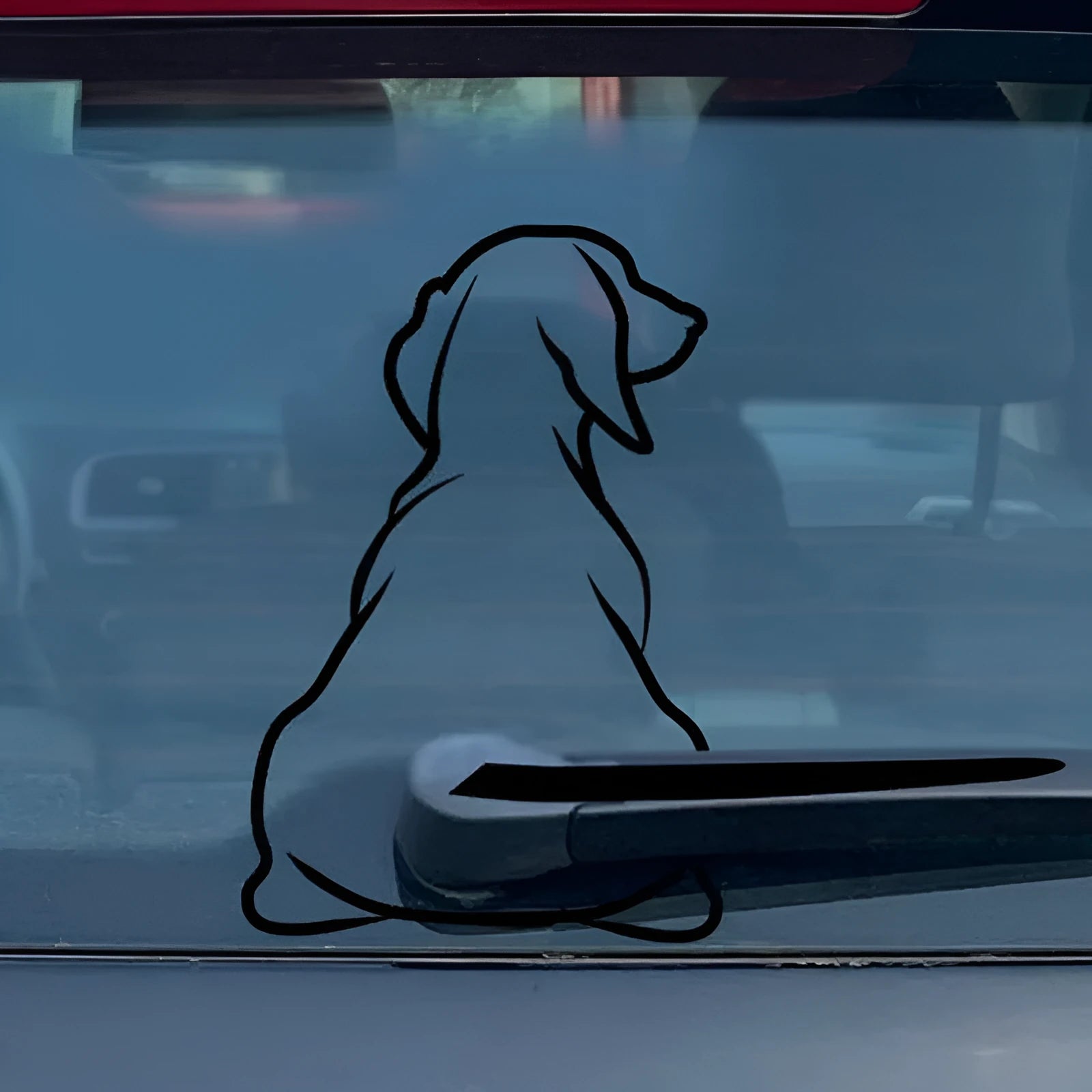 Cartoon dog car rear window sticker with wiper motion tail in black and white options.