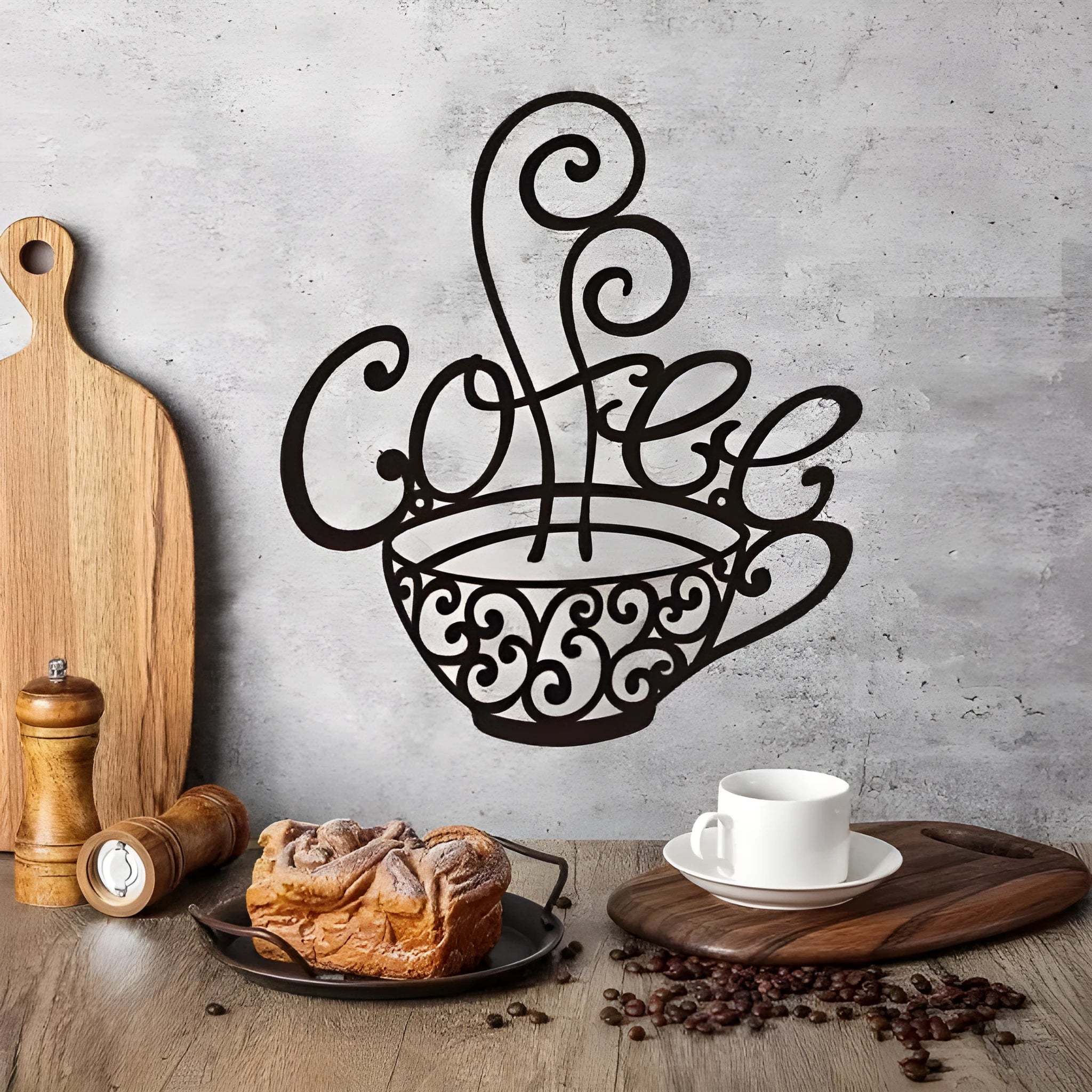 Black wrought iron wall decoration with English letter silhouettes measuring 26x28 cm