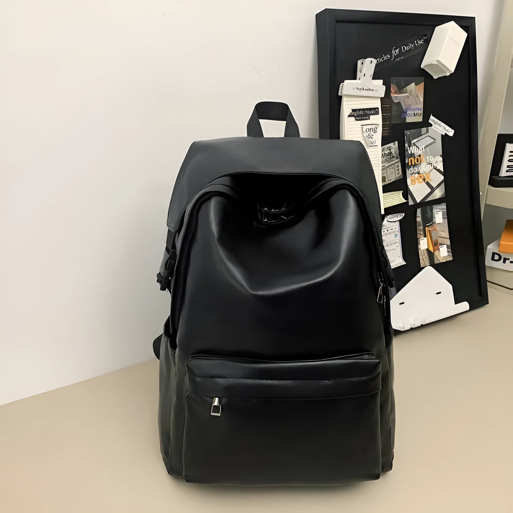 Travel Out large capacity PU leather backpack in black with air pillow belt and sewing thread design, 33x16x46cm