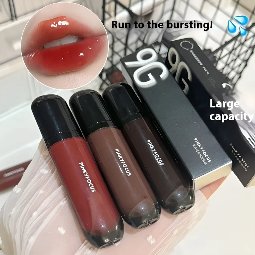 Black shiny makeup mirror lip lacquer tube showing one of six Black Citrus colour options