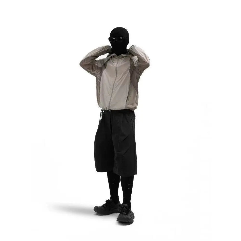 Nylon sun protective clothing with mesh stitching in desert brown colour showing regular length cut