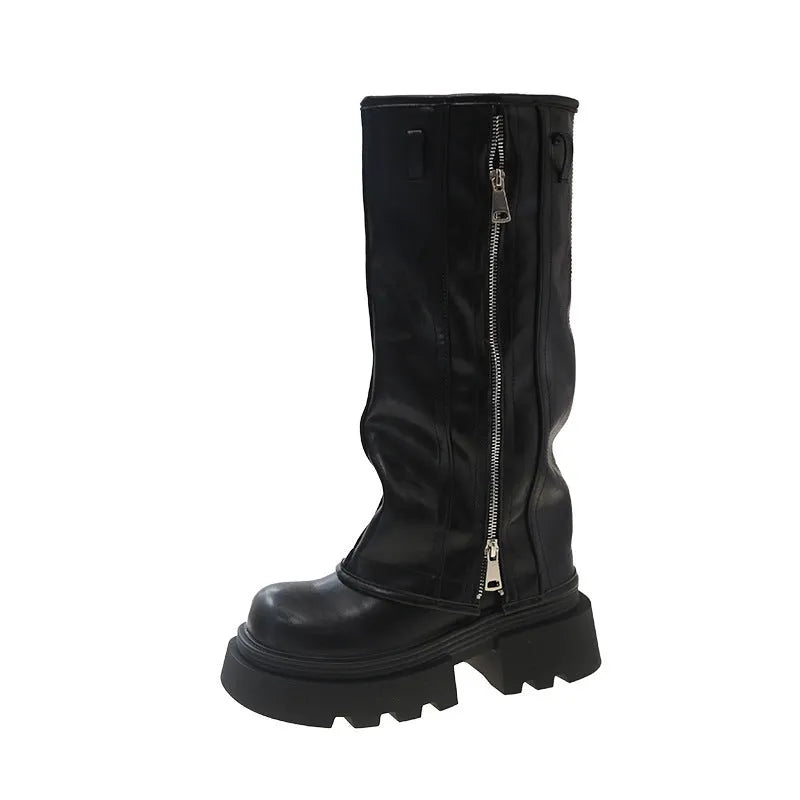 Black platform muffin pants Martin boots with a square heel and knee-high design on a white background.