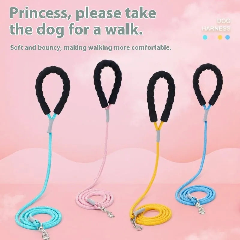Polyester dog vest and matching hand holding rope leash set in blue, green, pink, or yellow.
