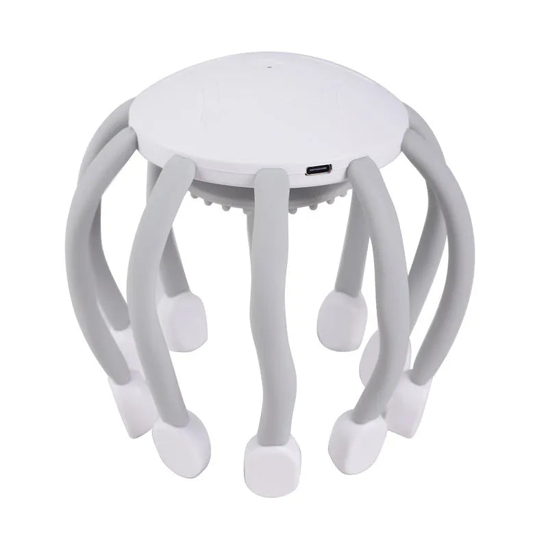 Black and white head massagers with multiple claws and USB cable for charging.