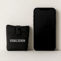 Black portable inflatable cushion made of 40D nylon TPU fabric, deflated for storage
