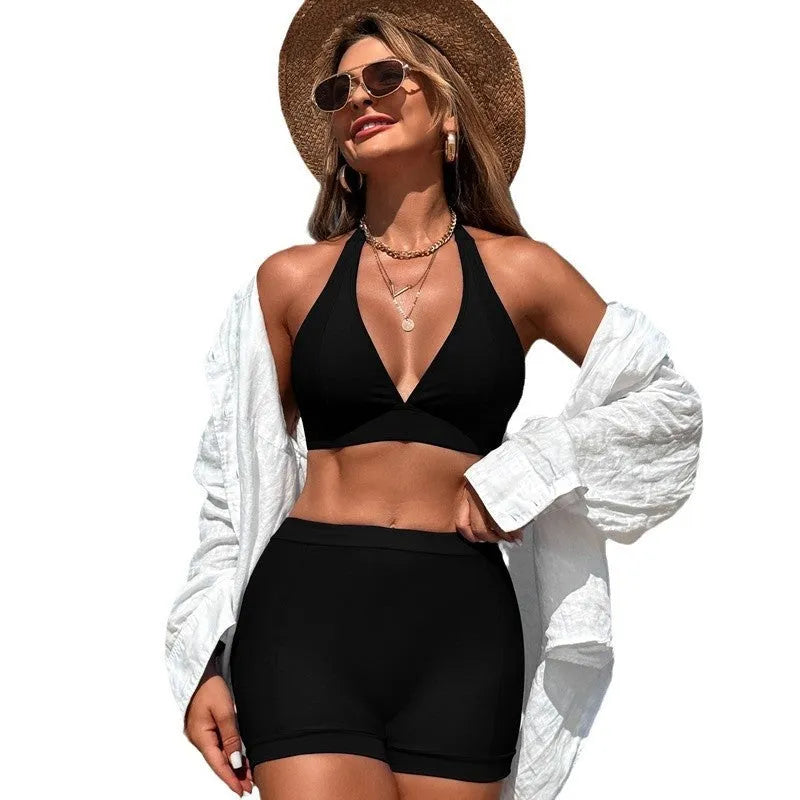 Women's black nylon bikini swimsuit on a white background