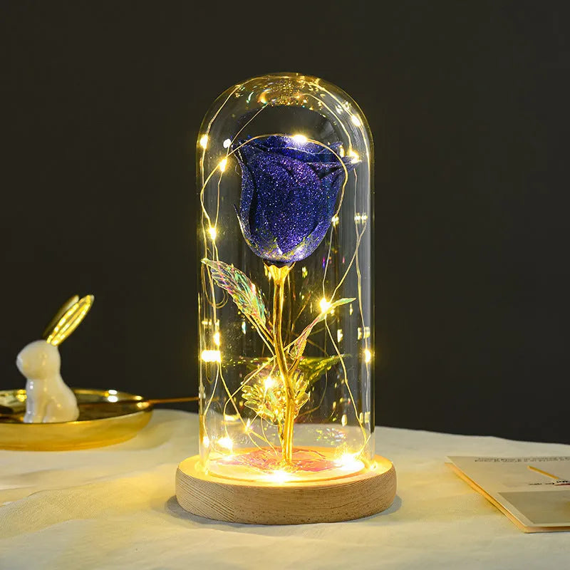 Eternal rose flower LED light in glass cover with warm white glow, six colours available, handmade