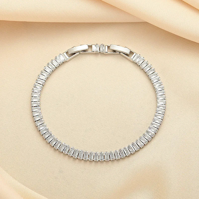 Rectangular brass women's bracelet with full diamond zircon inlays in champagne gold colour