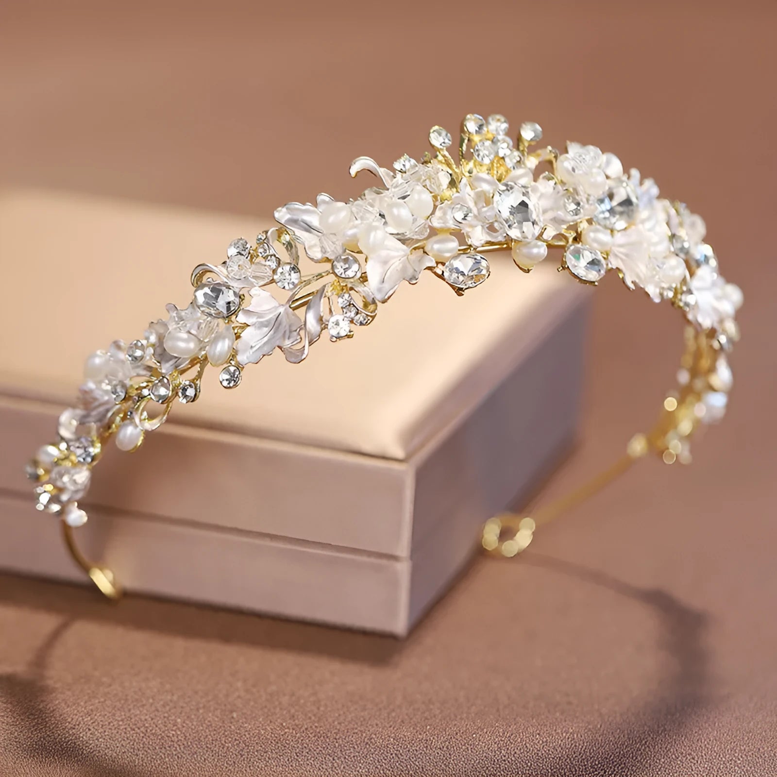 Pearl-decorated alloy crown headdress hair accessory in a gold electroplated finish.