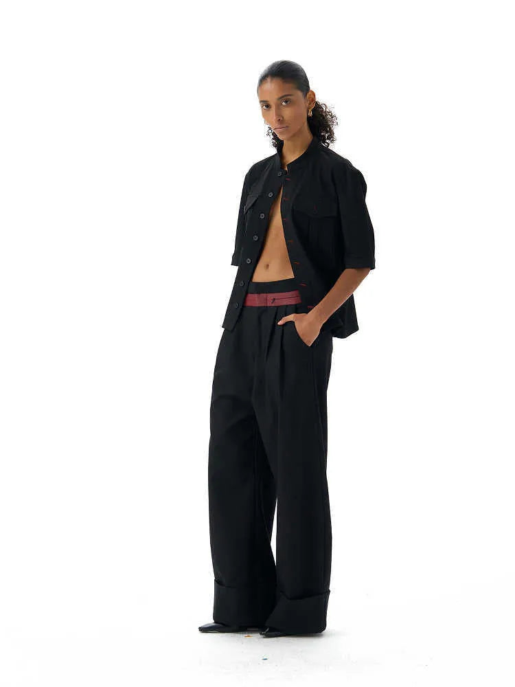 Black loose fit hunting shirt with half sleeves, shirt collar, and single-breasted placket