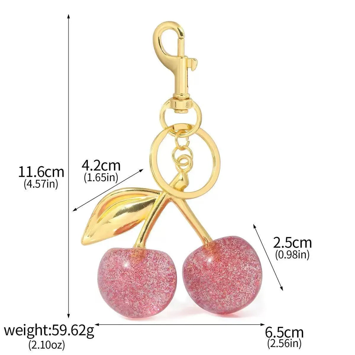Red or pink zinc alloy cherry pendant keychain for car keys and bags.
