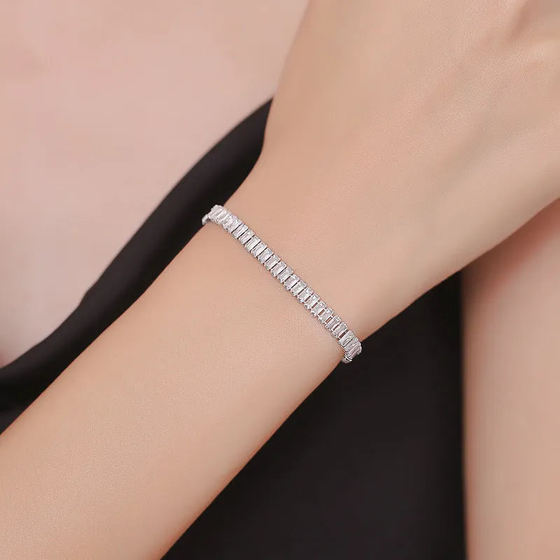 Rectangular brass women's bracelet with full diamond zircon inlays in champagne gold colour