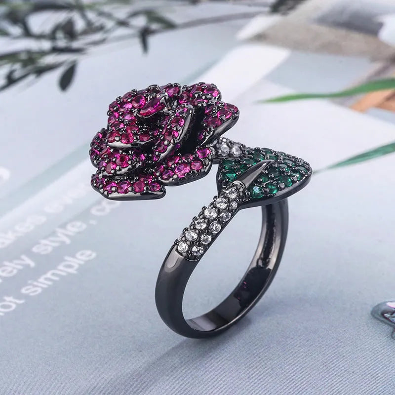 Women's black gold geometric flower personality ring with simulated red corundum stone