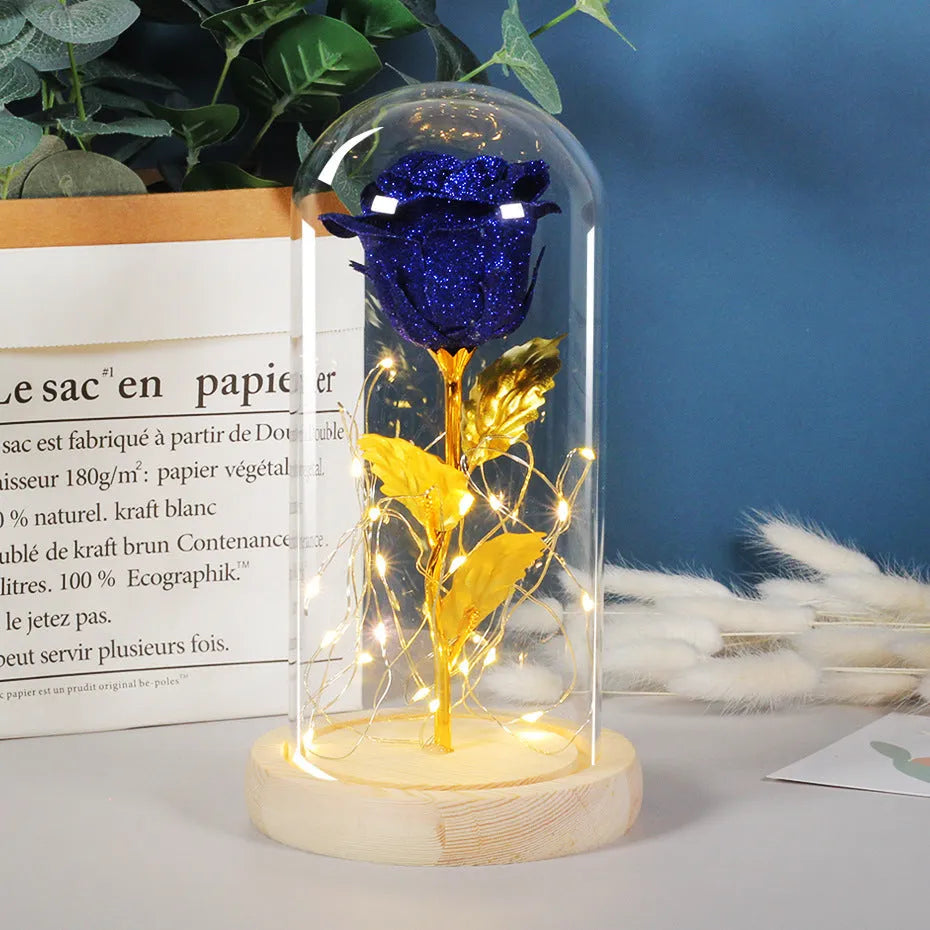 Eternal rose flower LED light in glass cover with warm white glow, six colours available, handmade