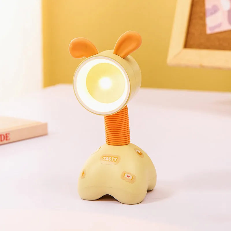 Cartoon animal magnetic night lamp with adjustable head on metallic surface