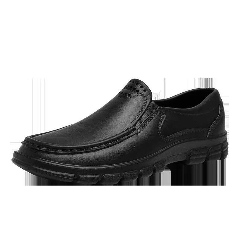 Men's black slip-on work shoes with a mid-top waterproof artificial leather upper and platform sole.