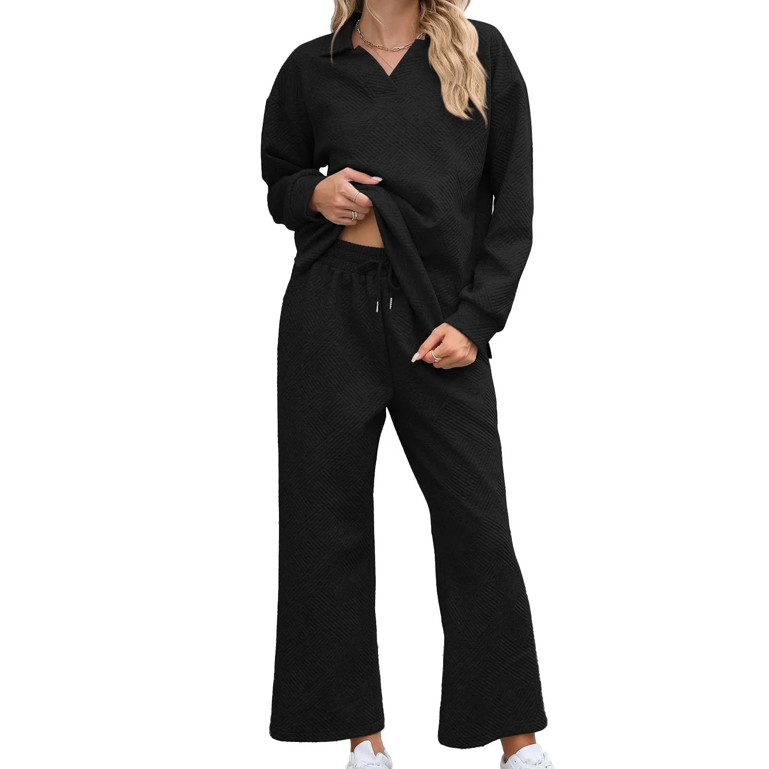 Women's solid colour rayon jacquard knit lapel sweater and elastic waist trouser set.
