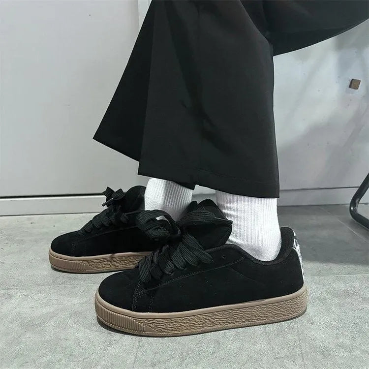 Black retro low-top sneakers with waterproof platform sole and artificial PU upper