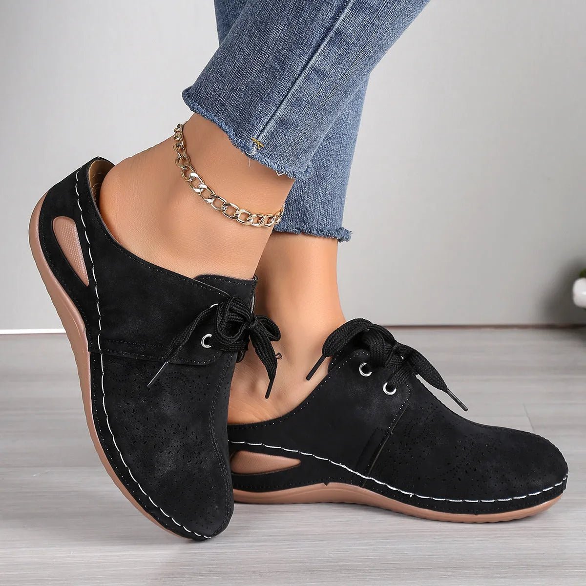 Women's lace-up Baotou slippers with hollow-out wedge design in suede material, available in multiple colours.