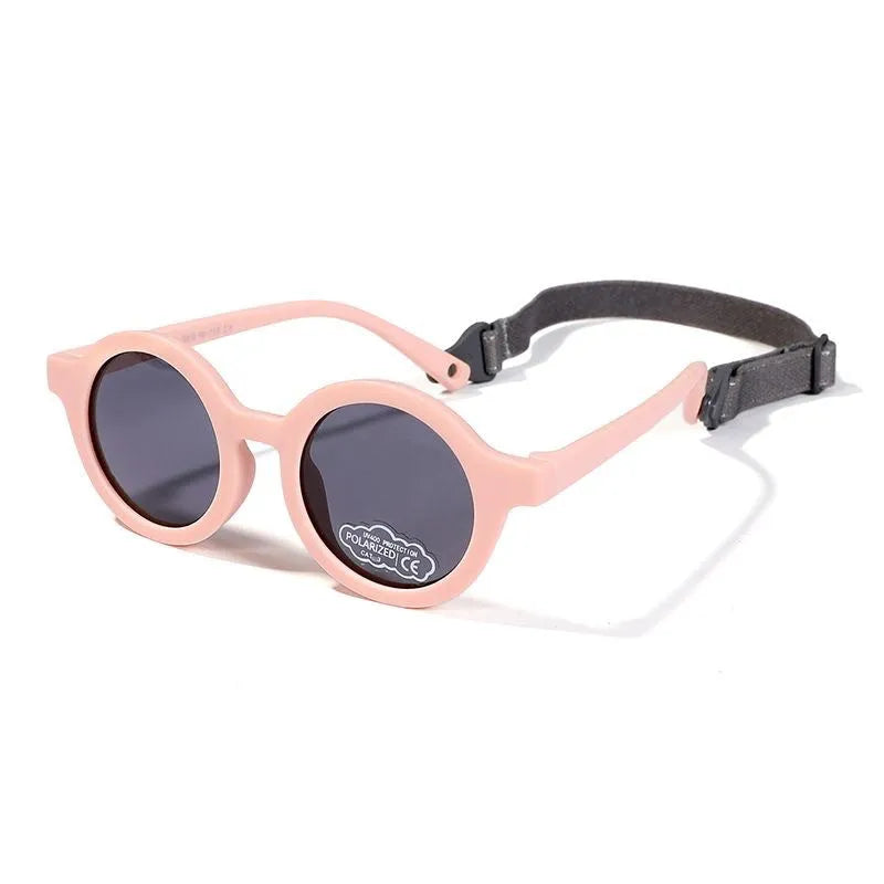 Children's round sunglasses for 0-3 year olds with UV400 protection, shown in a selection of colours.