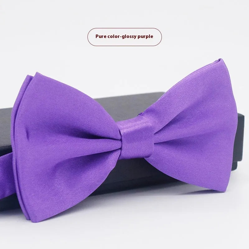 Solid colour polyester bow tie with flat head design measuring 12cm by 6cm