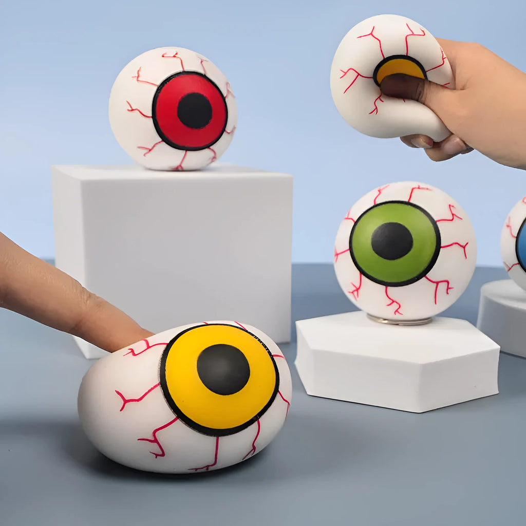 Flour eye ball stress toy made of TPR, 6cm diameter, random colour, on a plain background.