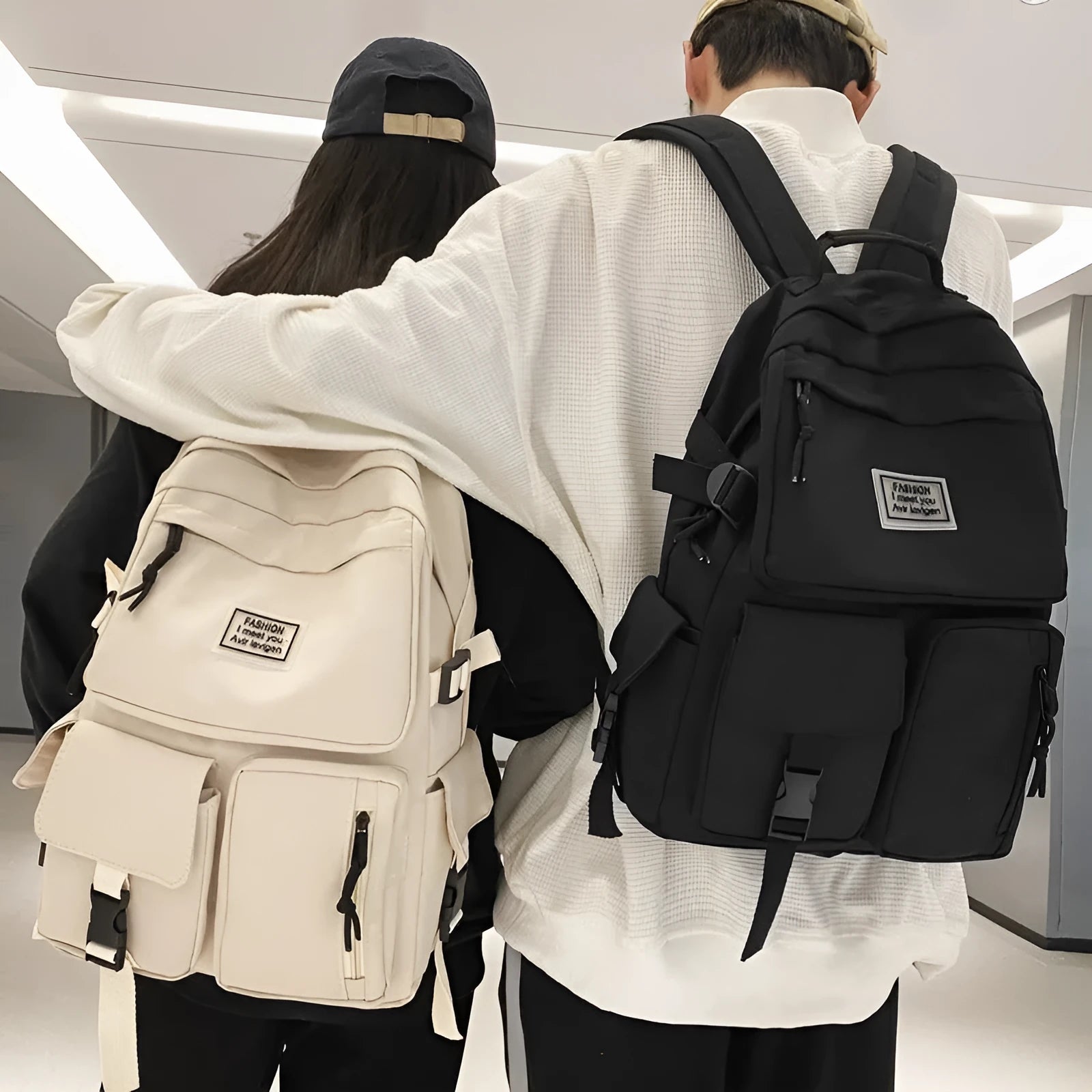 Black nylon student backpack showing laptop compartment and three-dimensional pockets