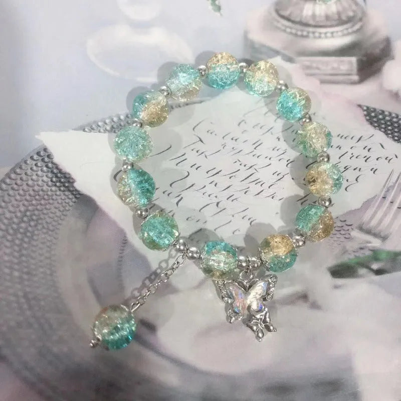Chinese style glass bracelet with bamboo joint details in a red Lvzhu Duobao design.