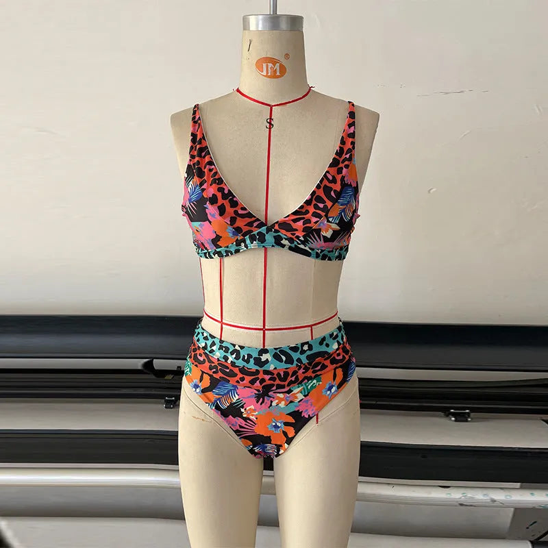 Women's floral print high-waist bikini set for swimming in polyester fabric.