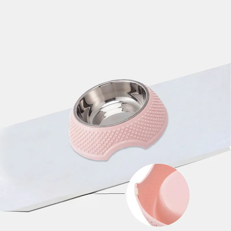 Set of four stainless steel pet bowls with coloured bases, shown from above.