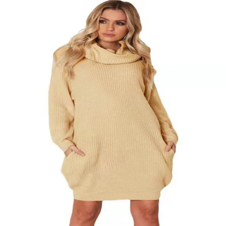 Loose fit mid-length pullover sweater with pockets in imitation cashmere fabric.