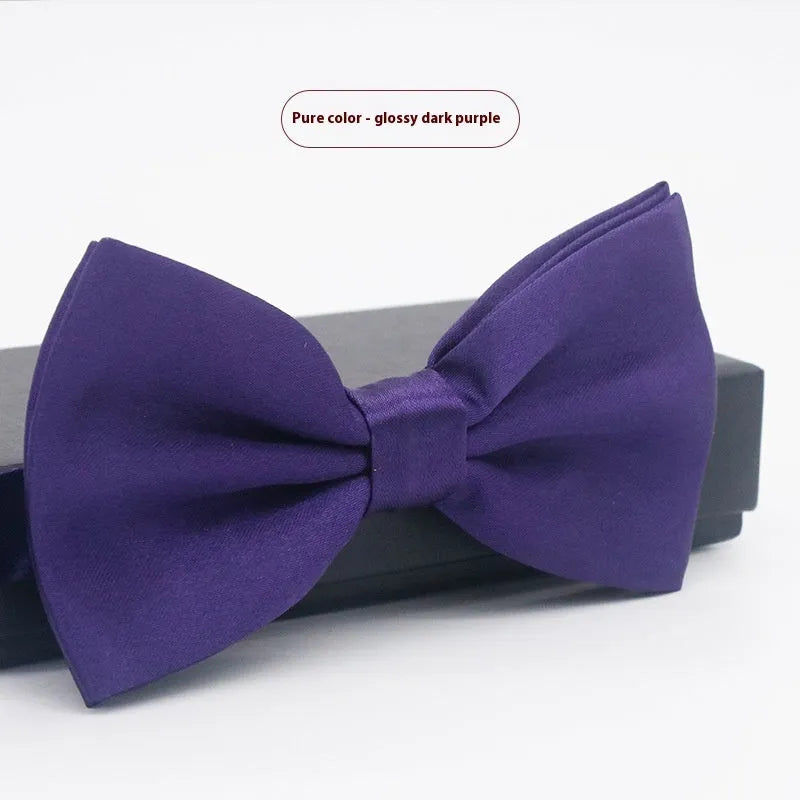 Solid colour polyester bow tie with flat head design measuring 12cm by 6cm