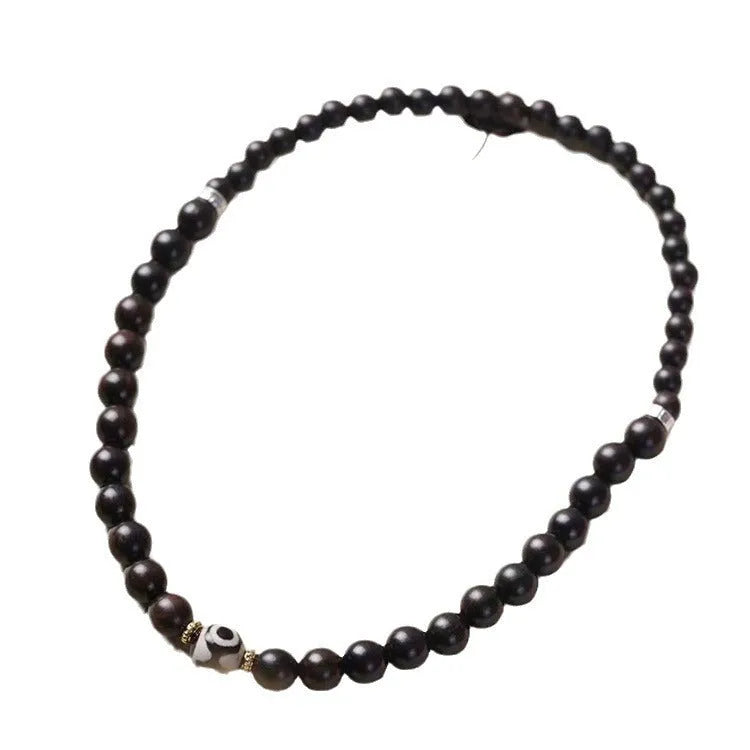 Ebony Tibetan beads bracelet with 8mm wood beads in two-circle design