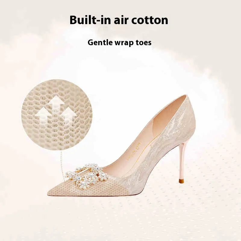 Champagne gold women's high heel pumps with pointed toe and stiletto heel on a plain background.
