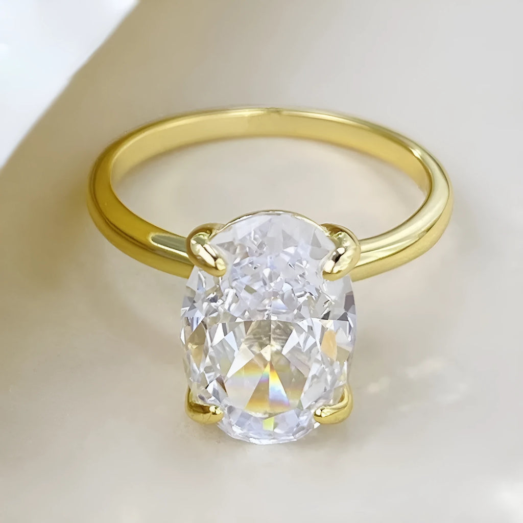 Oval gemstone ring for women with four-claw setting in gold or silver plating