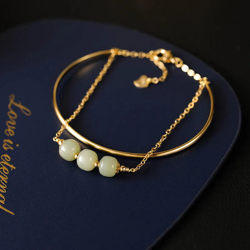 Jade lucky beads bracelet with gold inlay treatment in women's faux two-piece style