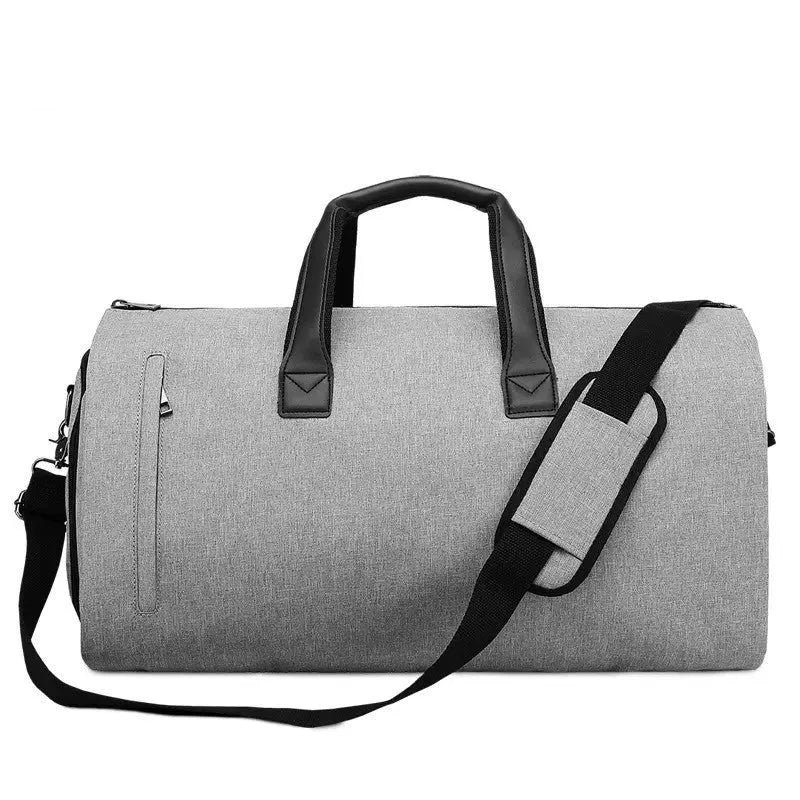 Medium oval travel bag in light grey oxford cloth, open to show internal organiser bags including camera insert and document pockets.