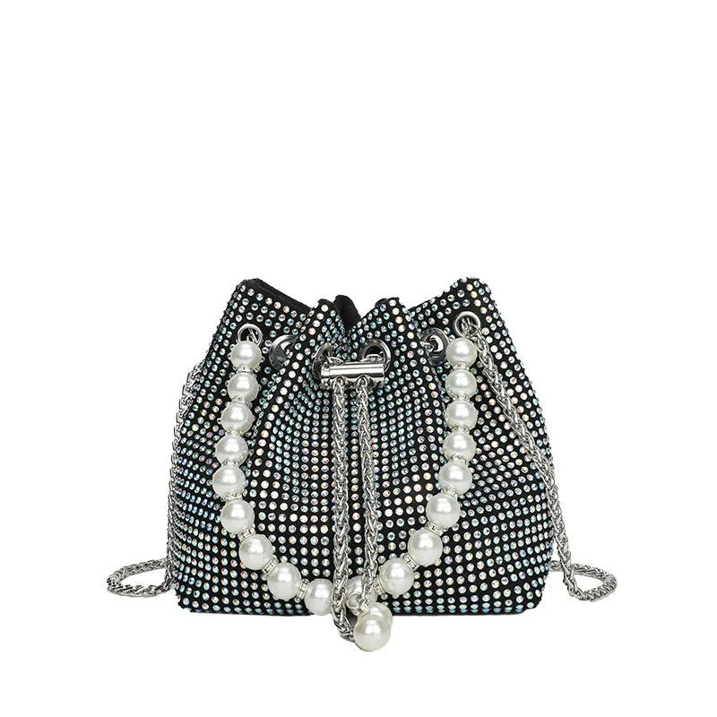 Light diamond pattern shoulder bag with western style chain crossbody and bucket shape design